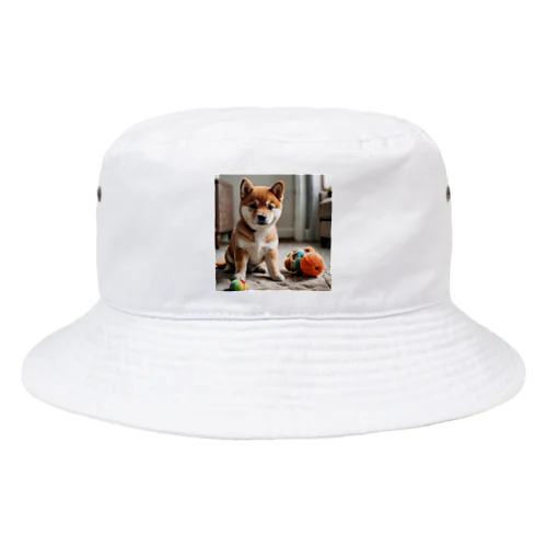 柴犬のかわいい幼子が写真の中央にいる。 Bucket Hat