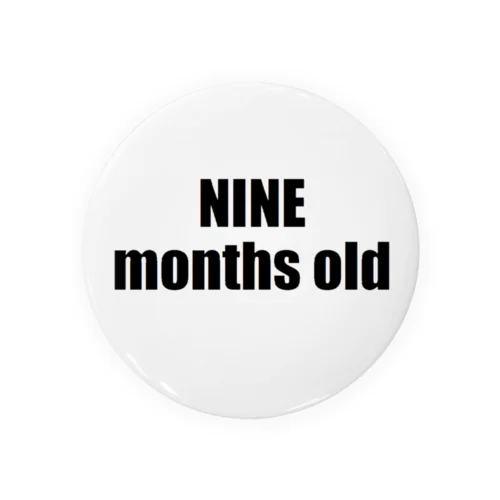 NINE months old Tin Badge