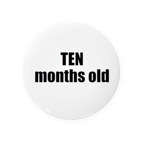 TEN months old Tin Badge