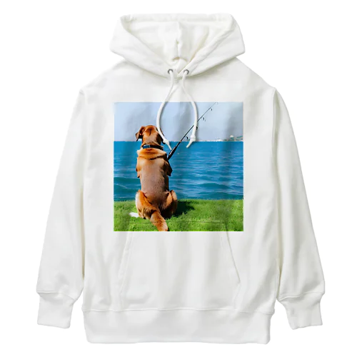 the dog is fishing fish Heavyweight Hoodie