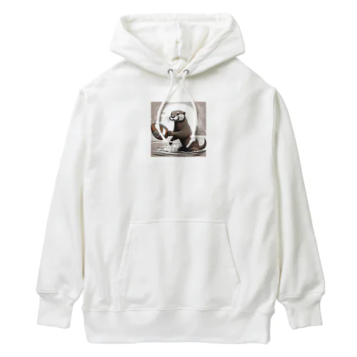 ラグビーボールを持つカワウソ Heavyweight Hoodie