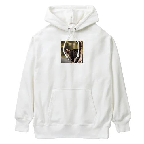 尻尾を立てて逃げようとしている猫 Heavyweight Hoodie