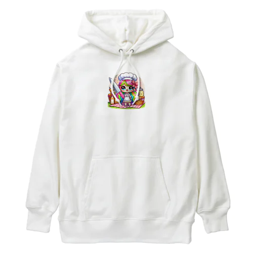 可愛い女の子が料理をしている様子が Heavyweight Hoodie