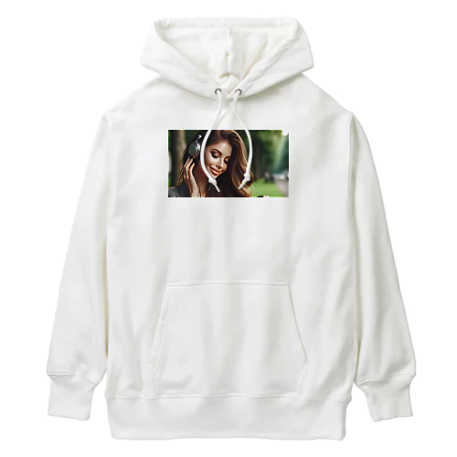 音楽を聴く女性 Heavyweight Hoodie