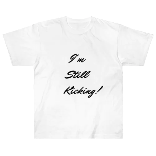 I'm still kicking.    まだ蹴っています。  私は生きていて、活動しています。 Heavyweight T-Shirt