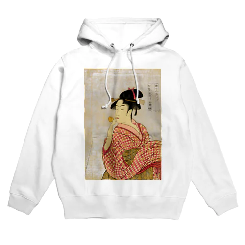 Young lady blowing on a poppin Hoodie