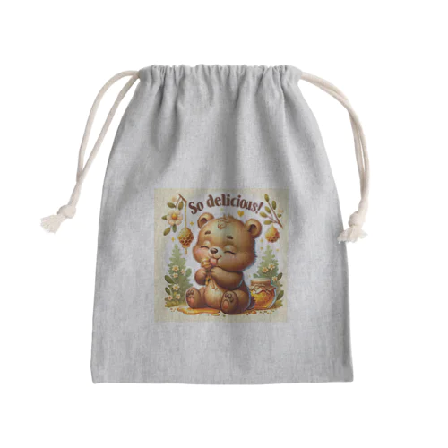 可愛い小熊が蜂蜜を美味しそうに舐めています Mini Drawstring Bag