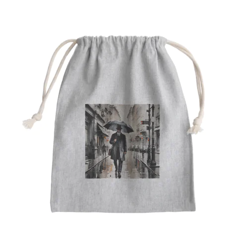 灰色の都会の舗道を歩く紳士 Mini Drawstring Bag