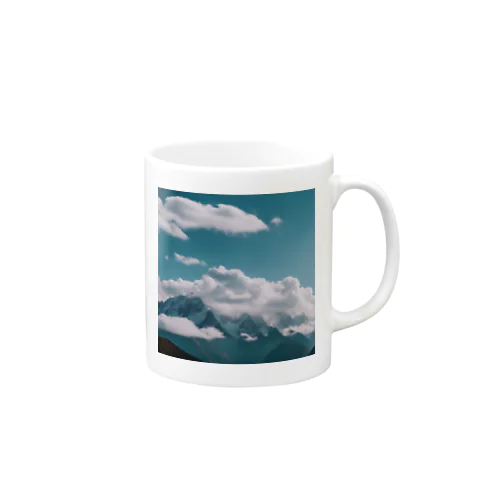 雲が高い峰々に包まれ、一面に広がる山岳地帯 Mug