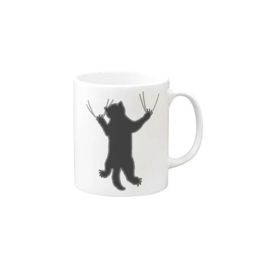 しがみつく黒猫 Mug