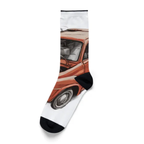 スポーティな赤い車がセンターに駐車。 Socks