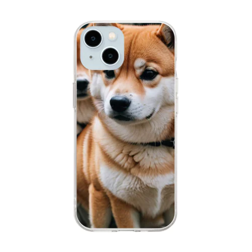 2匹のかわいい柴犬が仲良く並んで写っています。 Soft Clear Smartphone Case